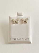 Load image into Gallery viewer, A pair of sterling silver 925 butterfly stud earrings packaged in a white box with the text 'Sterling Silver' visible.